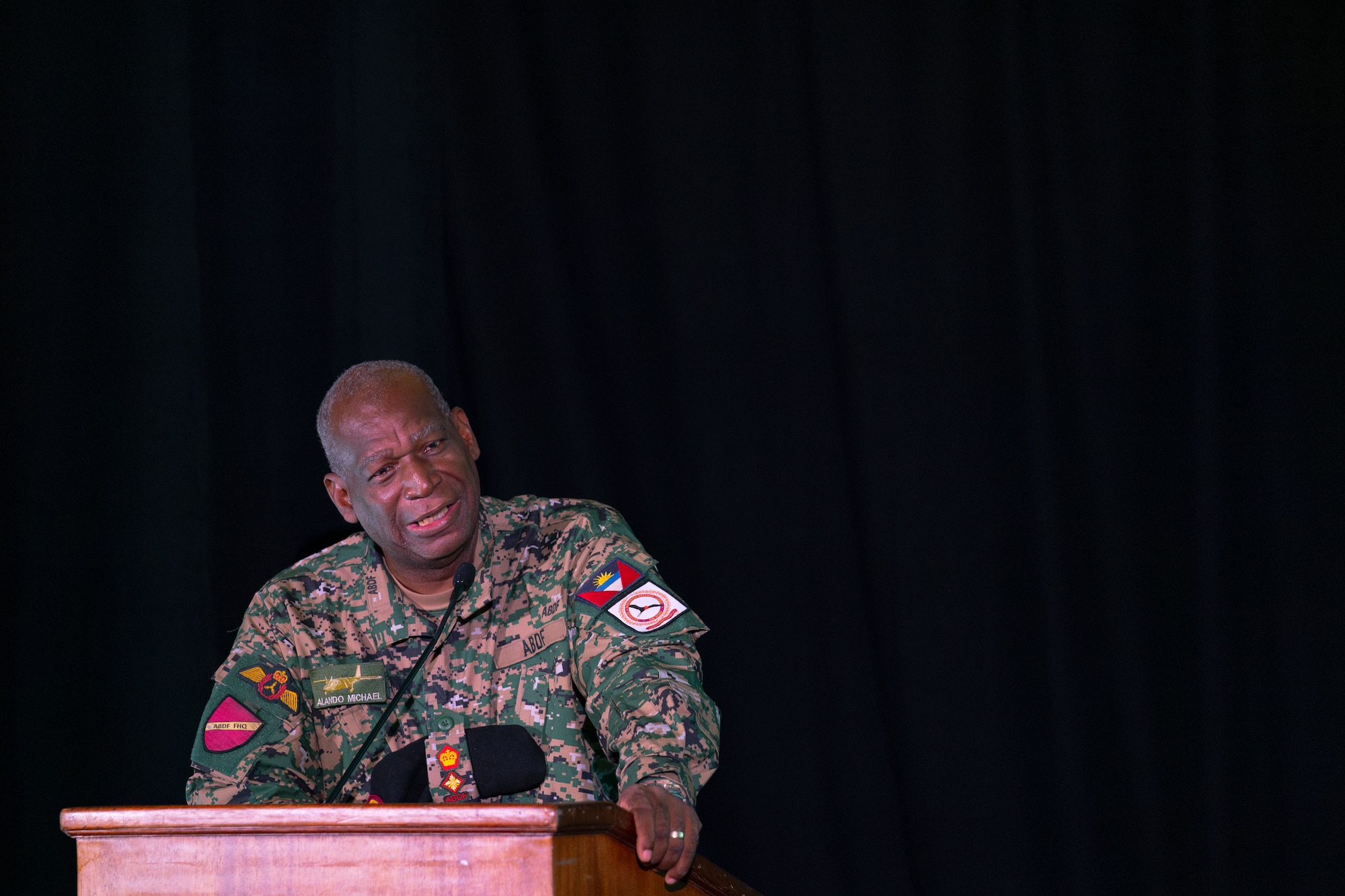 Lt. Col. Alando Michael, commanding officer, Antigua and Barbuda Air Wing speaks during the Central American and Caribbean Air Chiefs conference in Tucson, Arizona, Aug. 28, 2024. This was the first CENTAM-CARIB conference attended by Antigua and Barbuda Defense Force Air Wing, after its establishment just two years prior in 2022. (U.S. Air Force photo by Tech. Sgt. Rachel Maxwell)