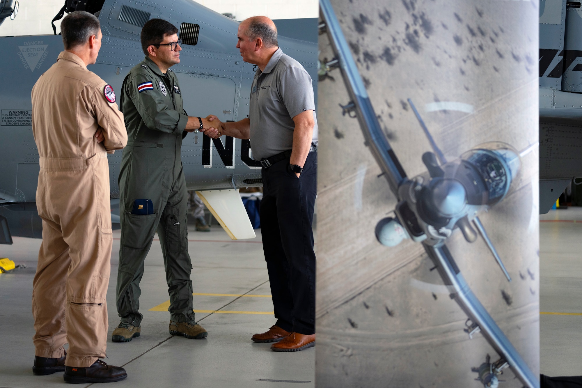 A Costa Rican Air Vigilance Service delegate shakes hands with an industry representative at Davis-Monthan Air Force Base, Arizona, during the Central American and Caribbean Air Chiefs conference, Aug. 27, 2024. Industry Day afforded air chiefs an opportunity to collaborate with eight industry partners on relevant technology solutions tailored to their specific needs and served as a starting point for potential future acquisitions. (U.S. Air Force photo by Tech. Sgt. Rachel Maxwell)