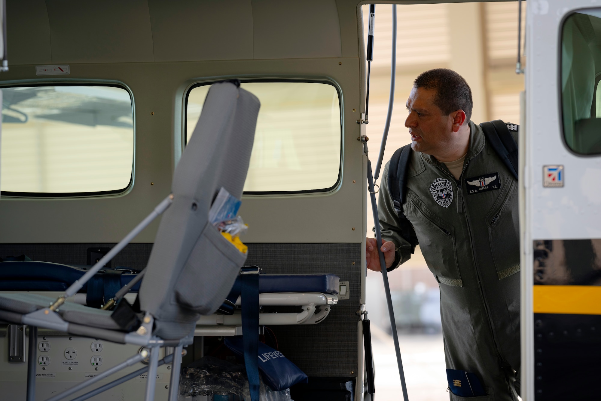 Costa Rican Air Vigilance Service Capitán Javier Moreira looks inside a Cessna Caravan aircraft during the Central American and Caribbean Air Chiefs conference—Industry Day at Davis-Monthan Air Force Base, Arizona, Aug. 27, 2024. Industry Day afforded air chiefs an opportunity to collaborate with eight industry partners on relevant technology solutions tailored to their specific needs and served as a starting point for potential future acquisitions. (U.S. Air Force photo by Tech. Sgt. Rachel Maxwell)