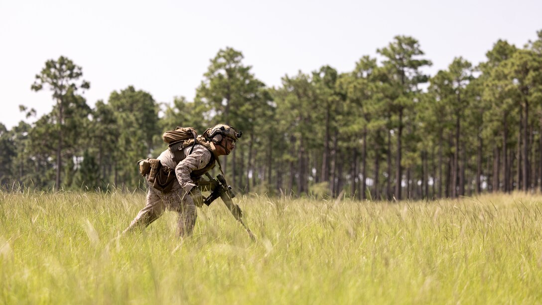U.S. Marine Corps Cpl. Dylan Landers, an Ohio native and infantry team leader with 1st Battalion, 6th Marine Regiment, 2d Marine Division, bounds towards a target during the Tactical Small Unit Leadership Course on Marine Corps Base Camp Lejeune, North Carolina, Aug. 15, 2024. TSULC provided small unit leaders with the confidence, knowledge and ability to better lead Marines in combat situations, contributing to the continued generation of combat ready forces. (U.S. Marine Corps photo by Lance Cpl. Brian Bolin Jr.)