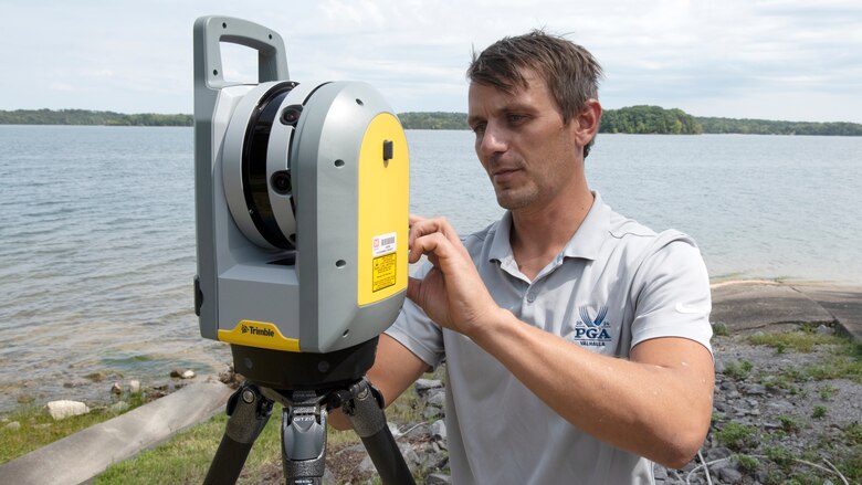 Surveyor Trevor Groce, U.S. Army Corps of Engineers Nashville District, operates a terrestrial scanner Sept. 3, 2024, to assess the condition of an existing boat ramp at J. Percy Priest Lake in Nashville, Tennessee. Groce is the district’s employee of the month for May 2024. (USACE Photo by Lee Roberts)