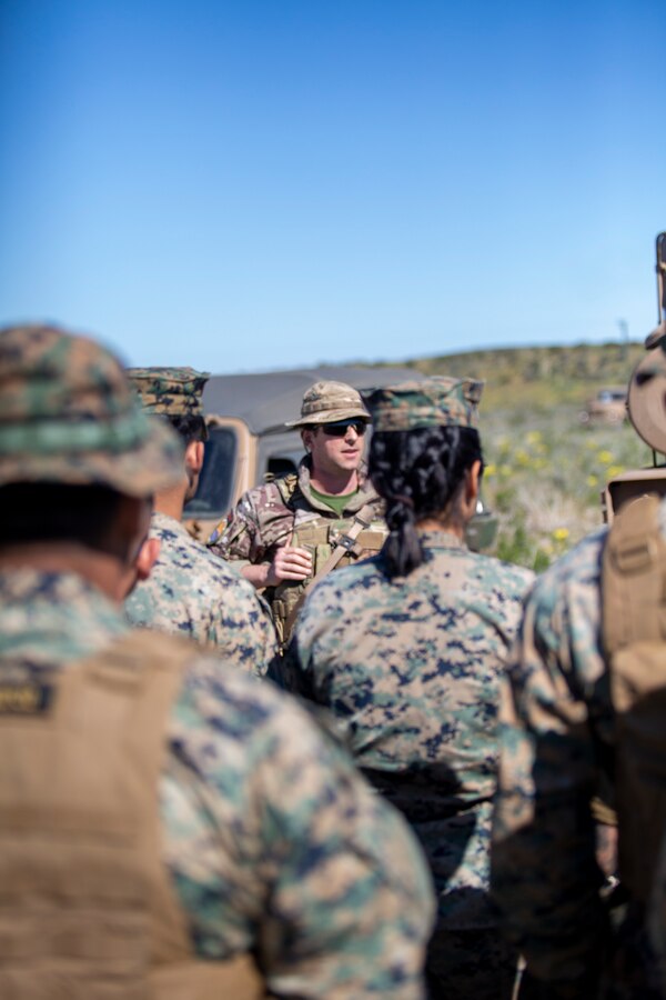 U.S. Marines with Marine Air Support Squadron 6, at the Expeditionary Advanced Base North in Puerto Aldea, Chile, listen to Chilean marines explain how they operate, take care of and repair their military vehicles during Exercise UNITAS LXV, hosted by Chile, on Sept. 3, 2024. EAB North was set up to facilitate multi-lateral training and provide amphibious operation training in the littorals. UNITAS, which is Latin for “unity”, was conceived in 1959 and has taken place annually since first conducted in 1960. This year marks the 65th iteration of the world’s longest running annual multinational maritime exercise. (U. S. Marine Corps photo by Lance Cpl. Payton Goodrich)