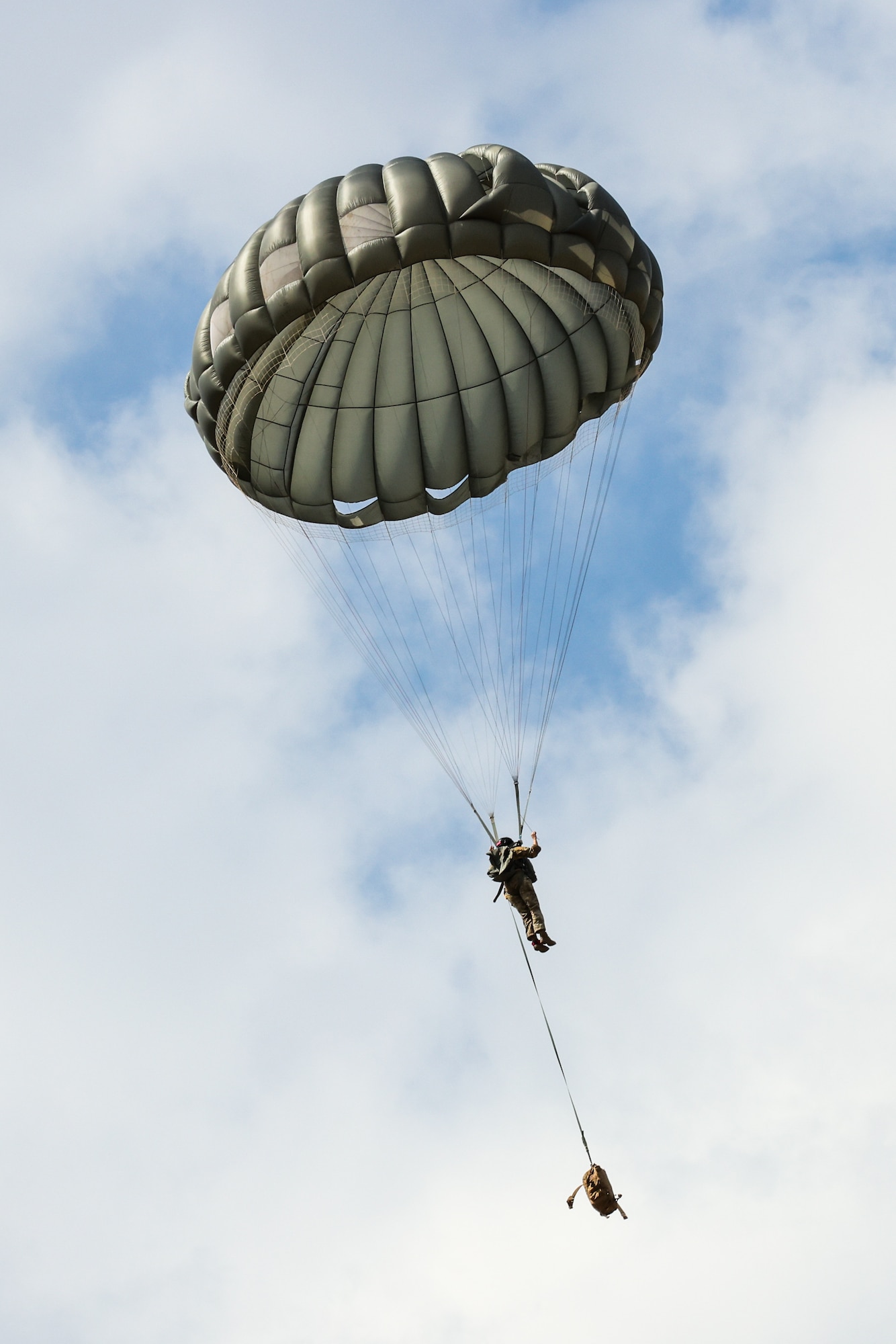 U.S. Air Force Tech Sgt. Trevor Coady, 435th Security Forces Squadron contingency response team chief, parachutes into a drop zone during Thracian Summer 2024, August 20, 2024, in Plovdiv, Bulgaria.