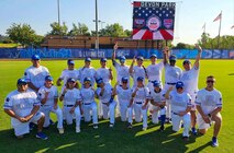 The All-Air Force Women’s Softball Team pose alongside members of the All-Air Force Men’s Softball Team during the Armed Forces Softball Championship held at Devon Park in Oklahoma City, Oklahoma, Aug. 14, 2024.