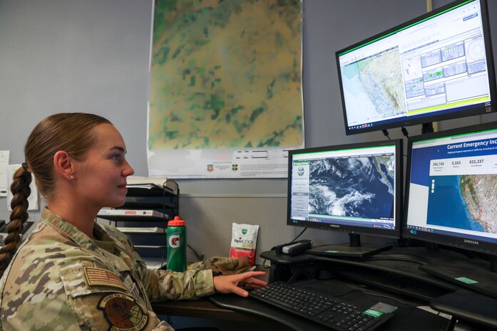 U.S. Air Force Airman 1st Class Grace Glotfelty, 9th Operations Support Squadron weather journeyman, surveys weather patterns near Beale Air Force Base, California, Aug. 27, 2024.