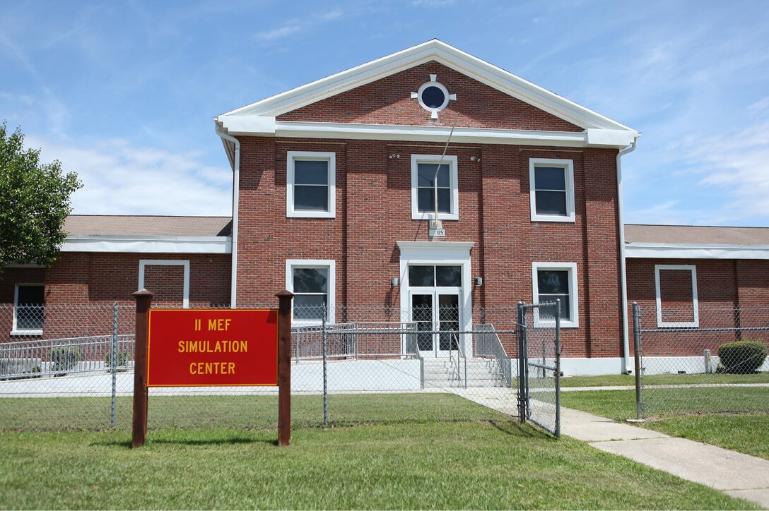Aboard Camp Lejeune, NC, the II MEF Simulation Center is located at the intersection of A Street and Julian C. Smith Drive (River Road). Building 127 is the headquarters for Small Unit Training and typically hosts Small Unit Exercises as well. Building 125 is the headquarters for Simulation supported Staff Training and also hosts Small Unit Exercises. (U.S. Marine Corps photo by Lance Cpl. Alexandria Blanche)