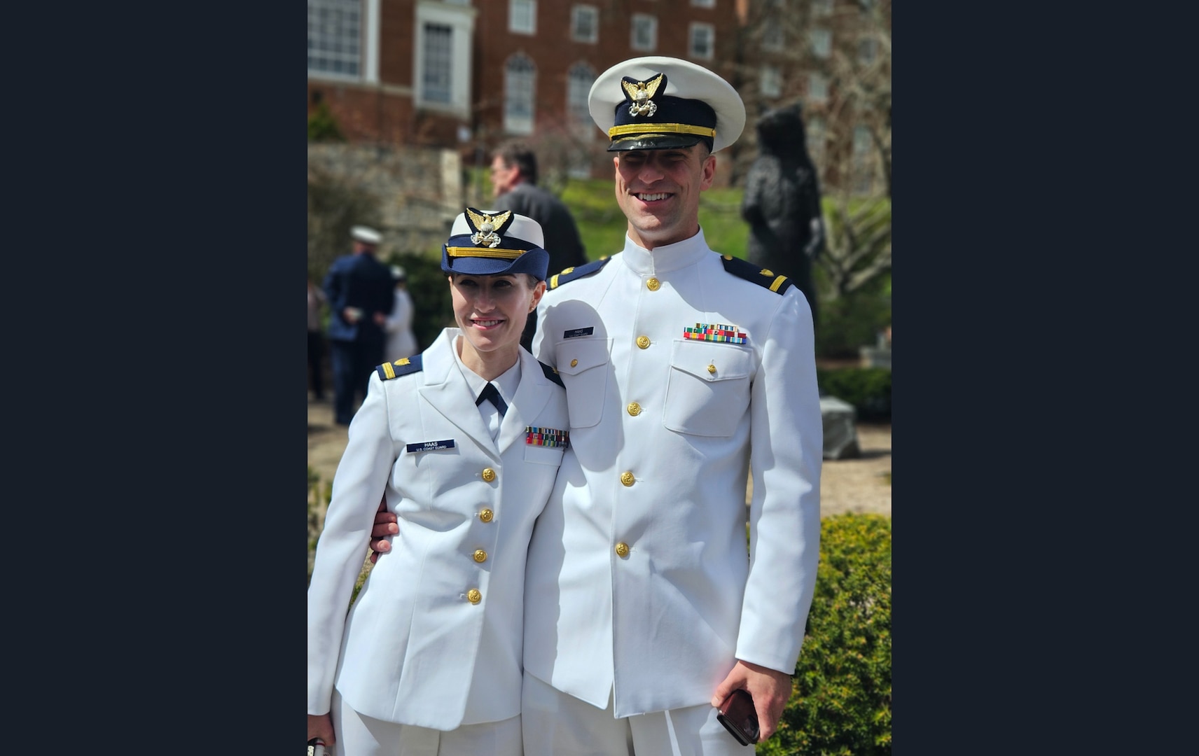 Both Natalie and Jacob Haas photographed standing together after their OCS graduation.