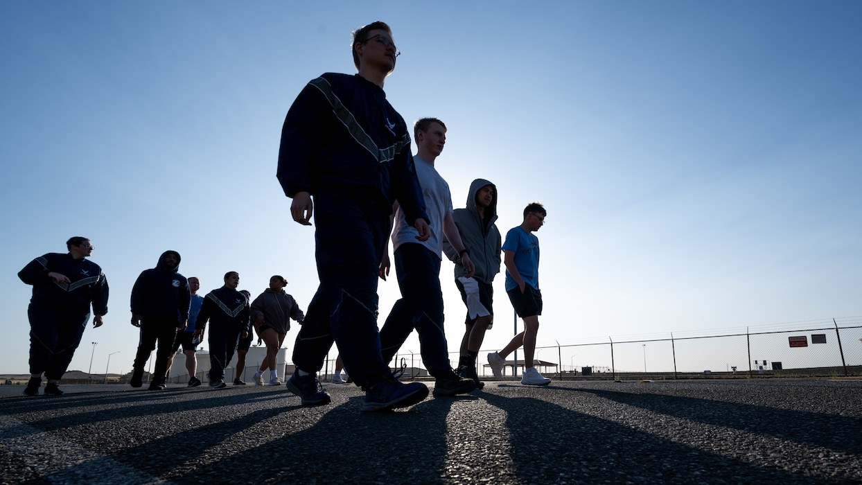 Airmen walk during memorial run