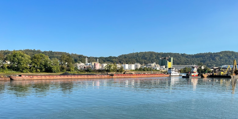 A barge passes through the newly-opened navigation channel at Elizabeth Locks and Dam.