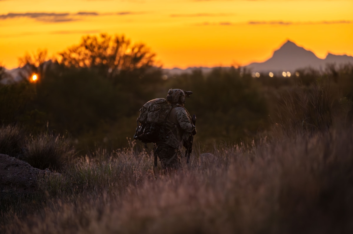 A U.S. Air Force pararescueman assigned to the 68th Rescue Squadron searches for a patient during the Combat Leader Course at Davis-Monthan Air Force Base, Arizona, Aug. 26, 2024. Airmen were required to locate, treat and exfiltrate patients during a low-light scenario. (U.S. Air Force photo by Airman 1st Class Jasmyne Bridgers-Matos)
