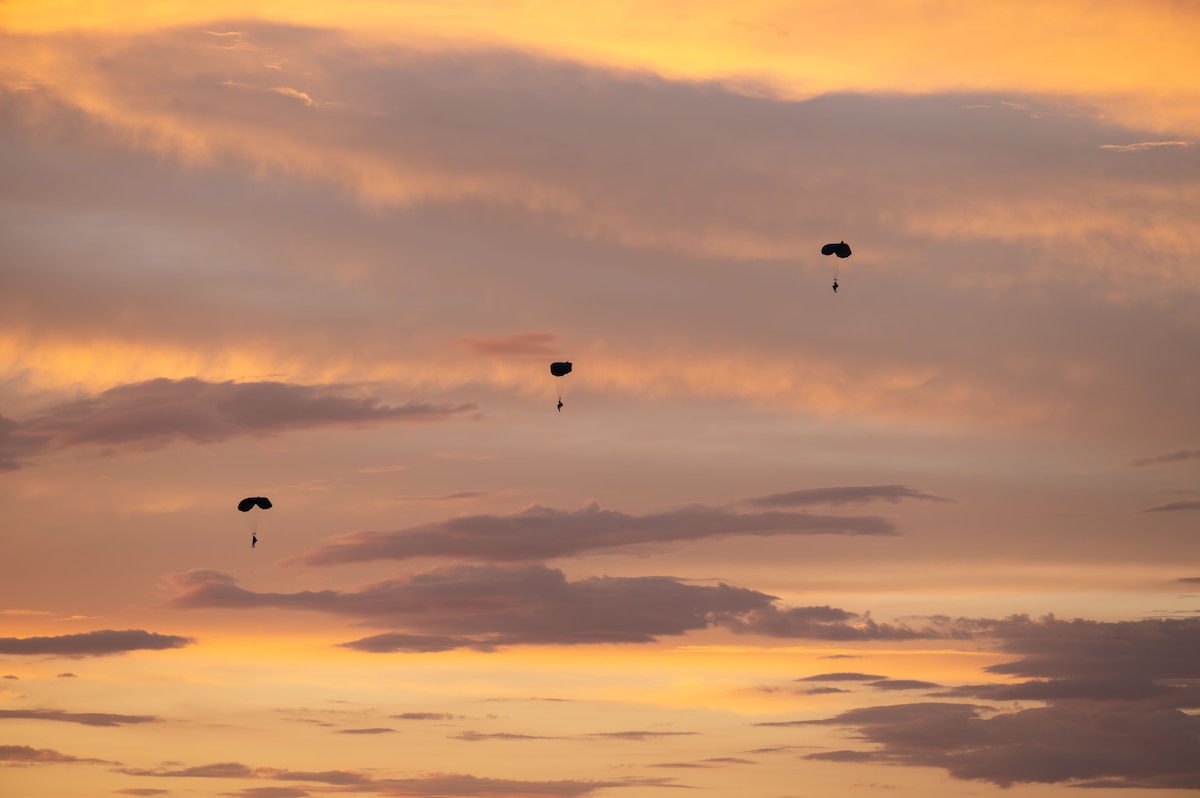 U.S. Air Force pararescuemen assigned to the 68th Rescue Squadron parachute to a simulated rescue site at Davis-Monthan Air Force Base, Arizona, Aug. 27, 2024. The Airmen searched for simulated patients to rescue during a training scenario. (U.S. Air Force photo by Airman 1st Class Jasmyne Bridgers-Matos)