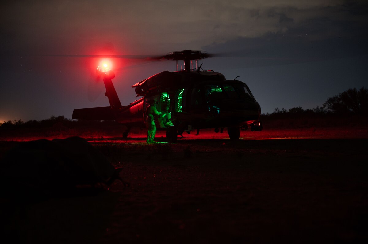 U.S. Air Force pararescuemen assigned to the 68th Rescue Squadron load simulated patients onto a Customs and Border Protection helicopter at Davis-Monthan Air Force Base, Arizona, Aug. 27, 2024. This scenario gave Airmen the opportunity to perform realistic patient exfiltration. (U.S. Air Force photo by Airman First Class Jasmyne Bridgers-Matos)