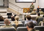 U.S. Army Sgt. 1st Class Scott Oakes gives an active threat response safety briefing to full-time staff members of the Colorado Department of Military and Veterans Affairs at Joint Force Headquarters, Centennial, Colorado, Nov. 8, 2023.  This annual training prepares Colorado National Guard and DMVA personnel to respond to an active threat emergency.  (U.S. Air National Guard photo by Capt. Katherine Lee)
