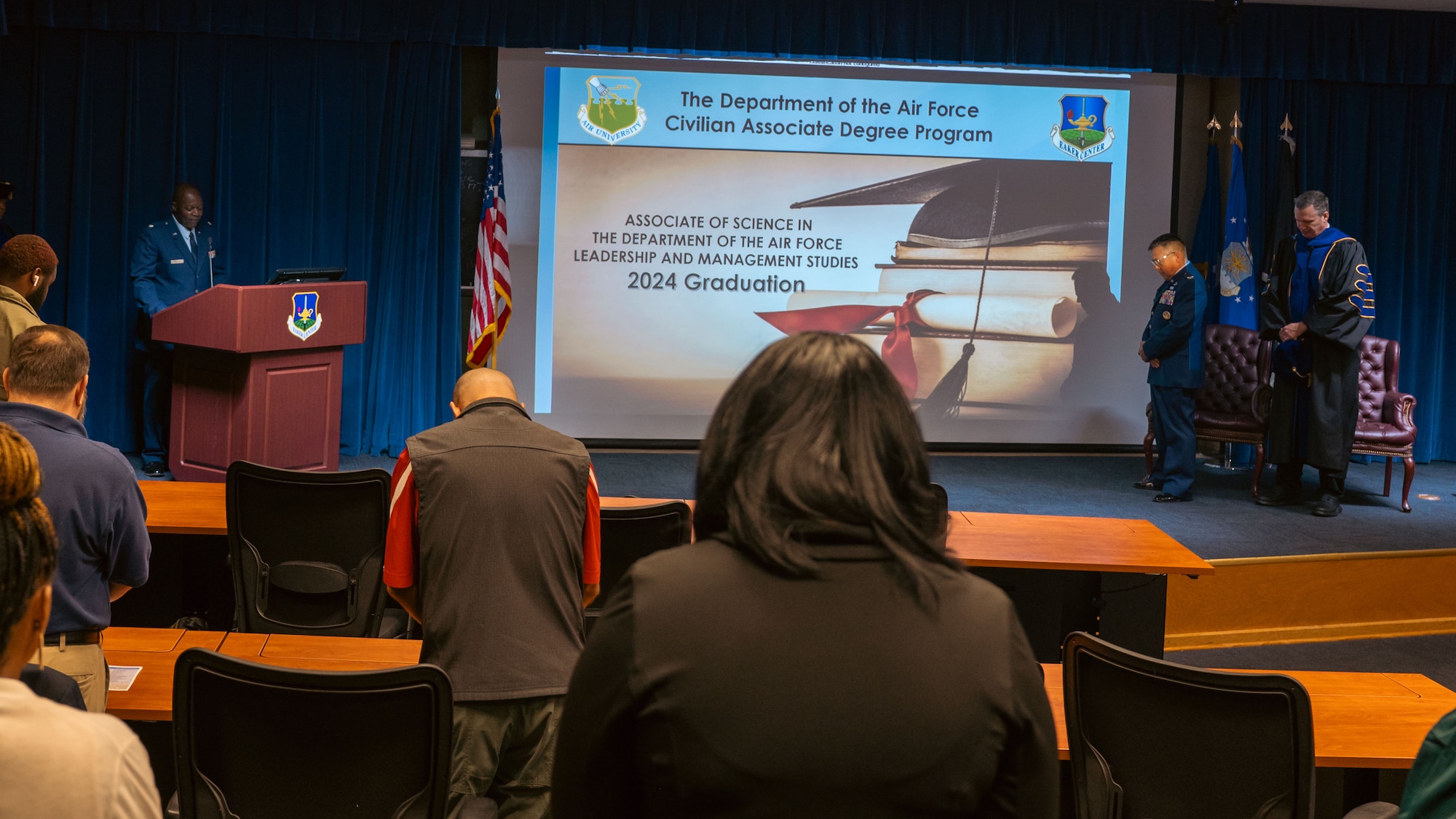 U.S. Air Force Col. Franklin Shifflett, Ira C. Eaker Center for Leadership development commander, speaks at the CADP graduation ceremony at Maxwell Air Force Base, Alabama, Sept. 5, 2024. The program is 60 credit hours and allows students to achieve an Associate of Science in the Department of the Air Force Leadership and Management Studies. (U.S. Air Force photo by Senior Airman Evan Lichtenhan)