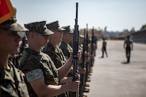 U.S. Marine Corps recruits with Lima Company, 3rd Recruit Training Battalion, are inspected as part of their final drill evaluation at Marine Corps Recruit Depot San Diego, California, Aug. 24, 2024. During the final drill evaluation, the platoons are scored based on their uniforms, bearing, and movements, as well as the senior drill instructor’s cadence, sword control, and movement commands. (U.S. Marine Corps photo by Sgt. Jesse K. Carter-Powell)