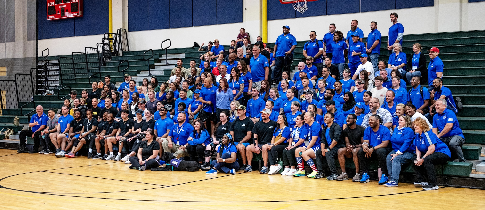 Air Force Wounded Warrior event participants and support staff take a group photo during the event’s closing ceremonies at Joint Base Lewis-McChord, Washington, Aug. 30, 2024.