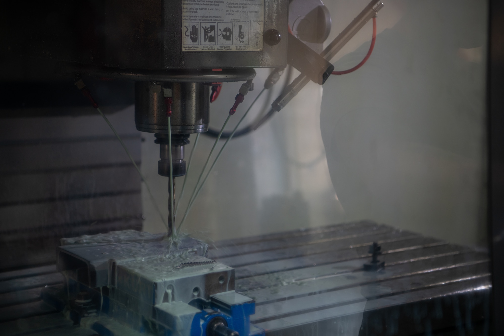 A CNC machine creates a pocketing hole for a drum hoist