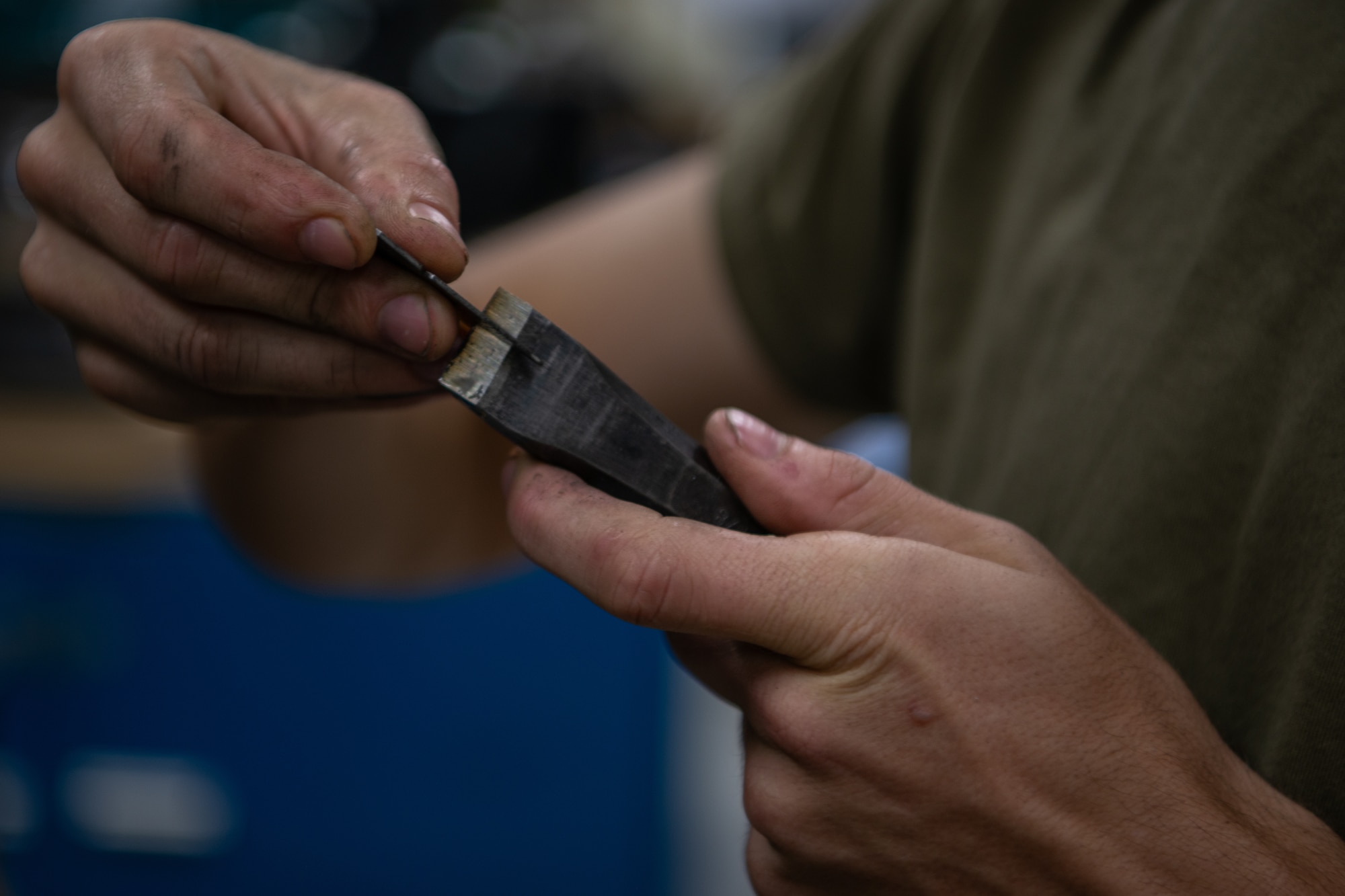 Checking the edge of a sharpened chisel