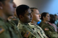 Soldiers watch as Col. Robert Le'iato assume command for the Army Finance and Comptroller School in a ceremony held July 30, 2024 in the Soldier Support Institute Auditorium. (U.S. Army photo by Robert Timmons)