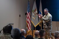Col. Robert L. Le'iato, commandant of the Finance and Comptroller School and chief of the Finance Corps, speaks after assuming command of the school during a ceremony held in the institute's auditorium, July 30, 2024. (U.S. Army photo by Robert Timmons)