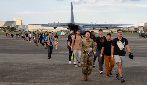 Airmen walking away from aircraft