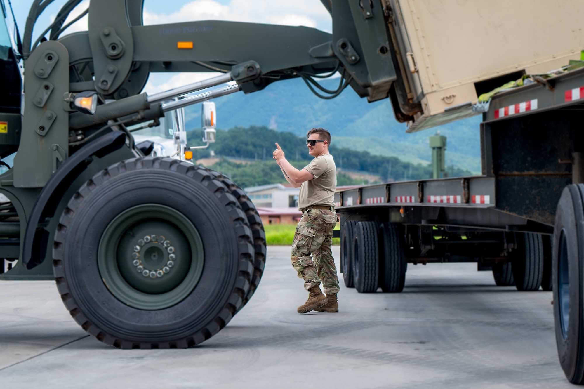 U.S. Air Force Senior Airman Kaleb Sullenberger, 51st Logistics Readiness Squadron ground transportation operations center dispatcher, guides a forklift to load cargo for transport during Ulchi Freedom Shield 24 at a cooperating base location in the Republic of Korea, Aug. 22, 2024. Participating in comprehensive joint training events such as UFS24 reinforces the 51st Fighter Wing’s ability to “Fight Tonight” alongside Republic of Korea allies, defending the freedom of 51 million people amongst the ROK. UFS24 serves as a regular exercise between the ROK and the U.S., ensuring constant preparedness for military forces. (U.S. Air Force photo by Senior Airman Brittany Russell)