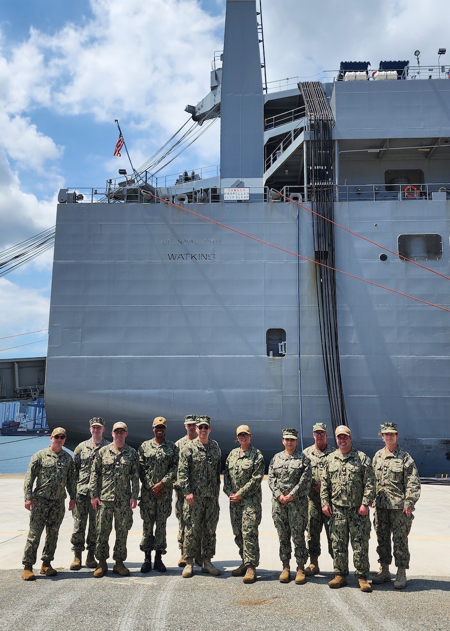 Navy Reserve Unit Military Sealift Command Far East Detachment 101, out of St. Louis, pose in front of large, medium-speed, roll-on/roll-off pre-positioning ship USNS Watkins (T-AKR 315) prior to participation in exercise Ulchi Freedom Shield 2024 (UFS 24), at Pier 8, Busan, South Korea, Aug. 16.  Exercise UFS 24 is a combined exercise between the U.S. and Republic of Korea (ROK) with participation from United Nations Command Member State militaries as well as U.S. and ROK governmental agencies to fortify the combined defense posture and enhance response capabilities. (Photo by Cmdr. Hannah Shipp)