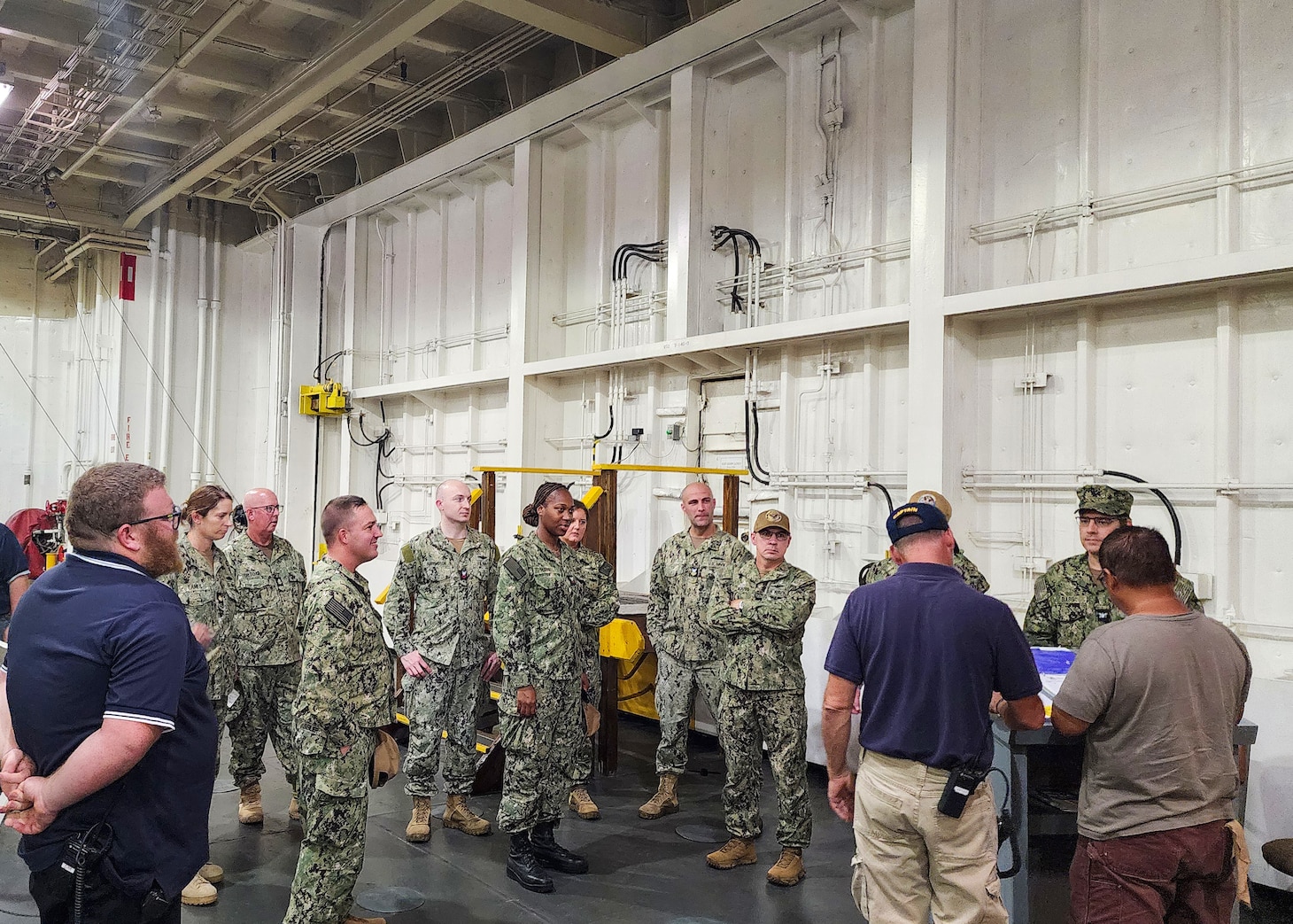 Navy Reserve Unit Military Sealift Command Far East Detachment 101, out of St. Louis, tour the large, medium-speed, roll-on/roll-off pre-positioning ship USNS Watkins (T-AKR 315) prior to participation in exercise Ulchi Freedom Shield 2024 (UFS 24), at Pier 8, Busan, South Korea, Aug. 16. Exercise UFS 24 is a combined exercise between the U.S. and Republic of Korea (ROK) with participation from United Nations Command Member State militaries as well as U.S. and ROK governmental agencies to fortify the combined defense posture and enhance response capabilities. (Photo by Cmdr. Hannah Shipp)