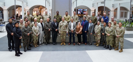 Group photo of multinational military personnel.