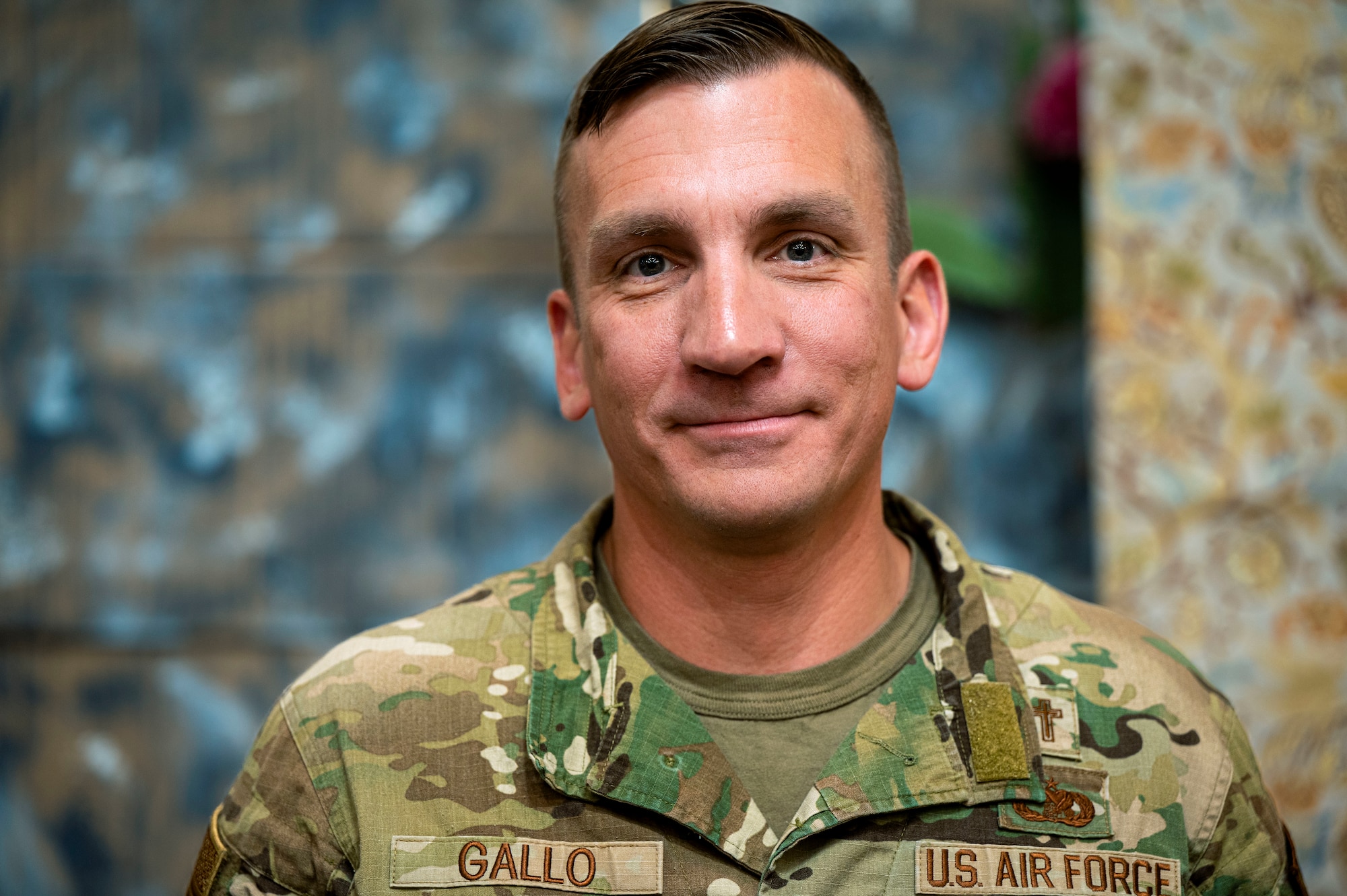 U.S Air Force Maj. Matthew Gallo, Space Base Delta 1 deputy chaplain, stands in the chapel at Peterson Space Force Base, Colorado, June 5, 2024. In Gallo’s 23-years of service, he has been on six combat-related deployments, four as enlisted and two after commissioning into the chaplaincy corps. (U.S. Space Force photo by Staff Sgt. Natalie Rubenak)