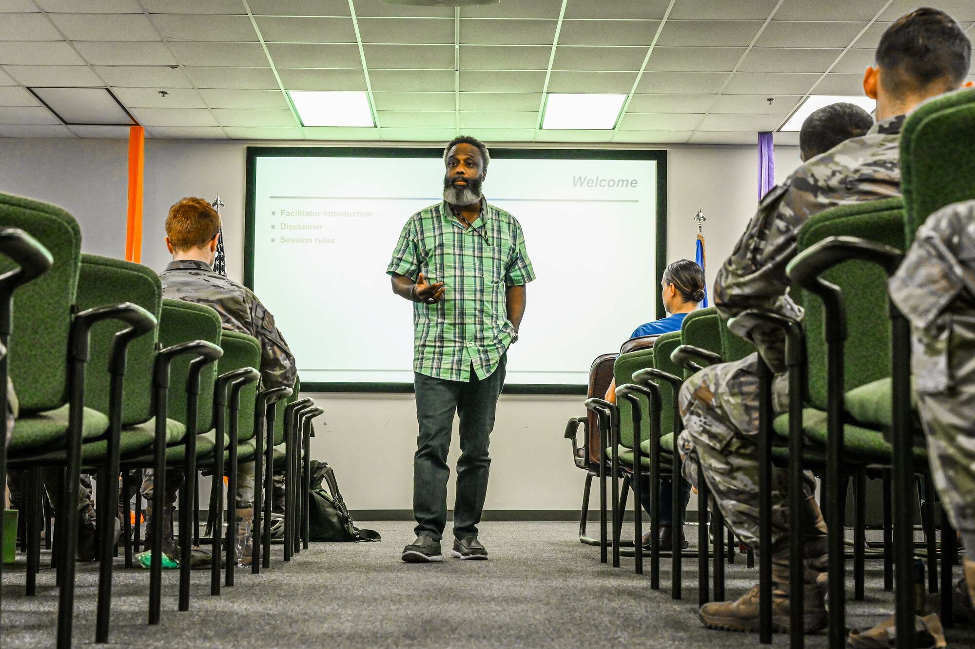 Wendell Browne, 97th Air Mobility Wing prevention specialist, walks down the aisle to speak to students in a suicide prevention class at Altus Air Force Base, Oklahoma, August 29, 2024. Browne believes suicide prevention is the most important class any Airmen will take in their lifetime. (U.S. Air Force photo by Senior Airman Kari Degraffenreed)