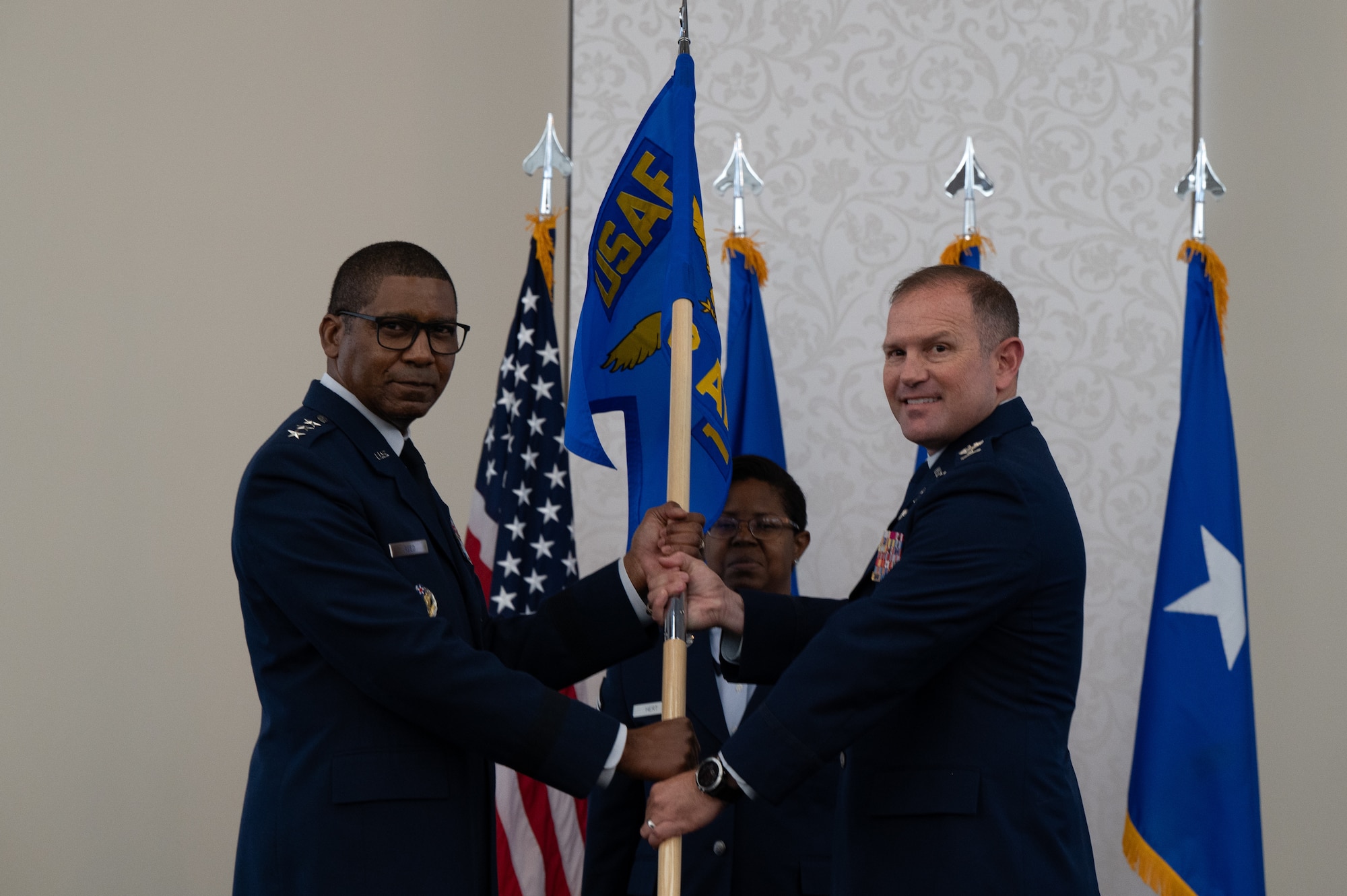 Reed passes the guidon to Arrington