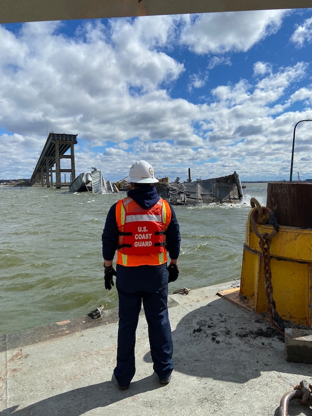 ASOFR LT Michael Gonzalez overlooking the aftermath of the bridge span 20-22, with debris built up after the top chord of the span was removed.