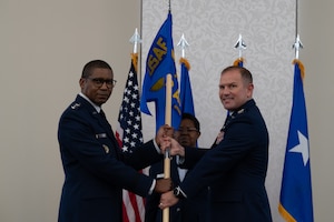Reed passes the guidon to Arrington