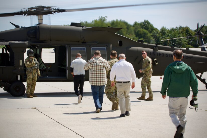 Soldiers with the 28th Expeditionary Combat Aviation Brigade operate UH-60 Black Hawk helicopters during a bosslift event at Army Aviation Support Facility #2 at Johnstown, Pennsylvania, Sept. 4, 2024. The event, which brings together employers to give them a glimpse into what their employees do while on military duty, was hosted by the Pennsylvania National Guard in conjunction with the Pennsylvania chapter of the Employer Support of the Guard and Reserve. (U.S. Army National Guard photo by Maj. Travis Mueller)
