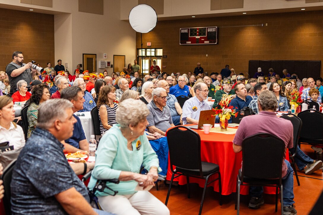 U.S. Marine Corps veteran Robert Brutinel celebrates his 100th birthday at the St. Anthony of Padua Community Center, Casa Grande, Ariz., Aug. 31, 2024. Marines with Recruiting Station Phoenix attended the celebration and presented Brutinel with gifts as a thank you for his honorable service during Iwo Jima. (U.S. Marine Corps photo by Sergeant Symira Bostic)