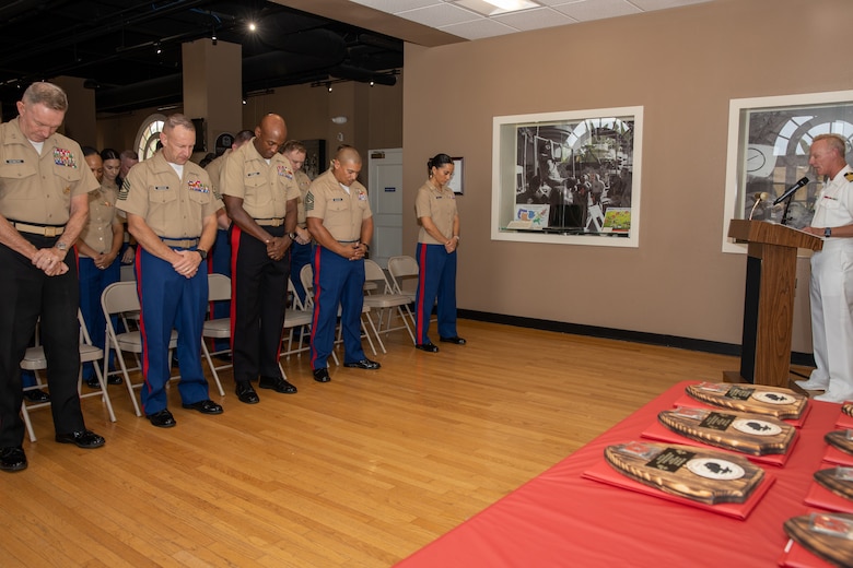 U.S. Marine Corps Maj. Gen. WIlliam Bowers, the commanding general of Marine Corps Recruiting Command, left, Sgt. Maj. Allen Goodyear, command senior enlisted leader with Marine Corps Recruiting Command, center left, Brig. Gen. James A Ryan II, the commanding general of Marine Corps Recruit Depot San Diego, center right, and Sgt. Maj. Carlos R. Aguilera, sergeant major of Headquarters and Service Battalion, right, recognize U.S. Marine Corps officers with the Marine Corps Recruiting Command for their outstanding performance and diligent efforts of the Western Recruiting Region Recruiting Offensive “Operation Overlord” at Marine Corps Recruit Depot San Diego, California, Aug. 1, 2024. Operation Overlord was a summer recruiting offensive held to foster competition amongst the recruiting force and increase productivity, while creating a contracting momentum for fiscal year 2025.  (U.S. Marine Corps photo by Cpl. Sarah M. Grawcock)