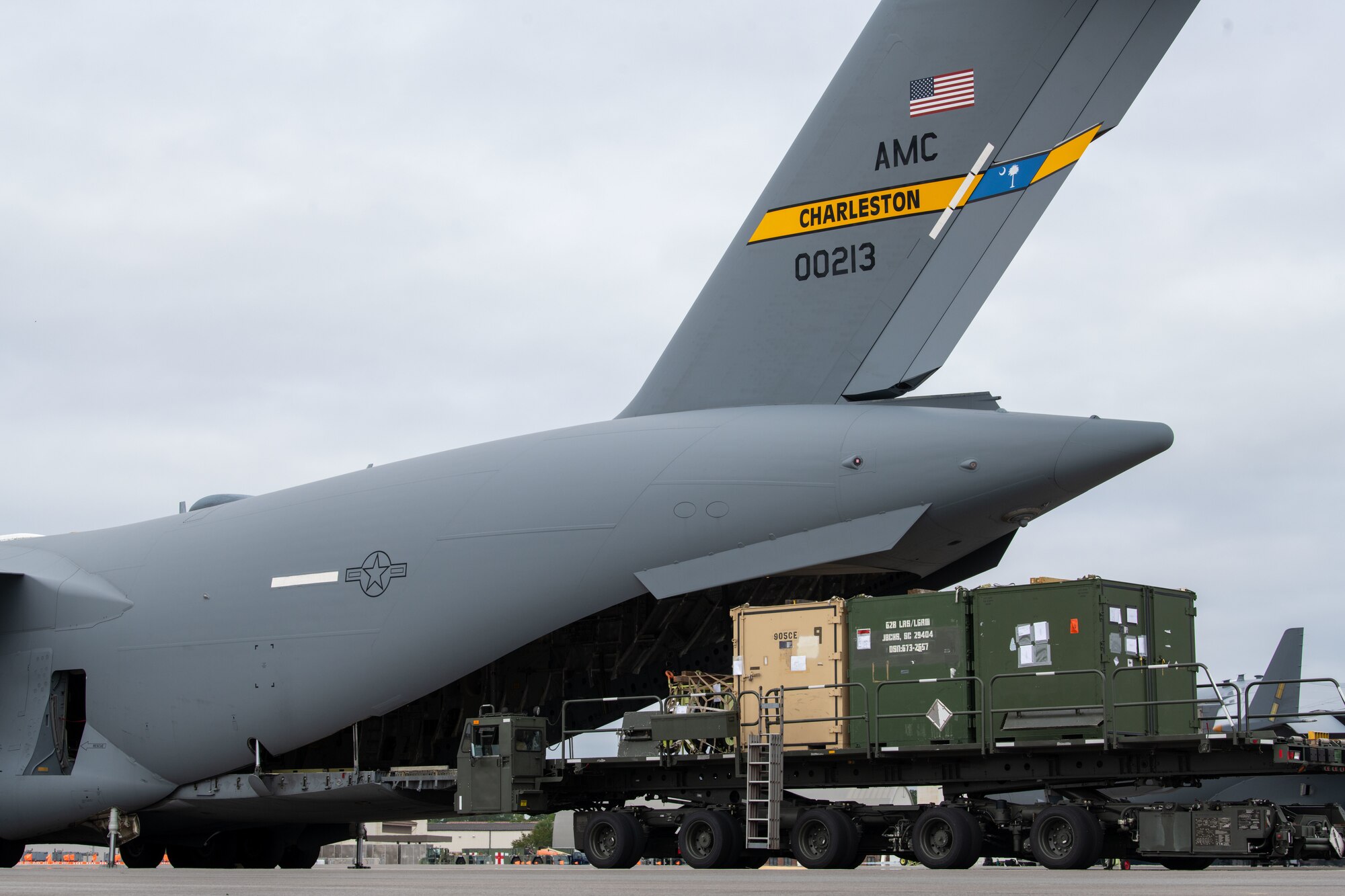 Cargo gets loaded in the airplane.