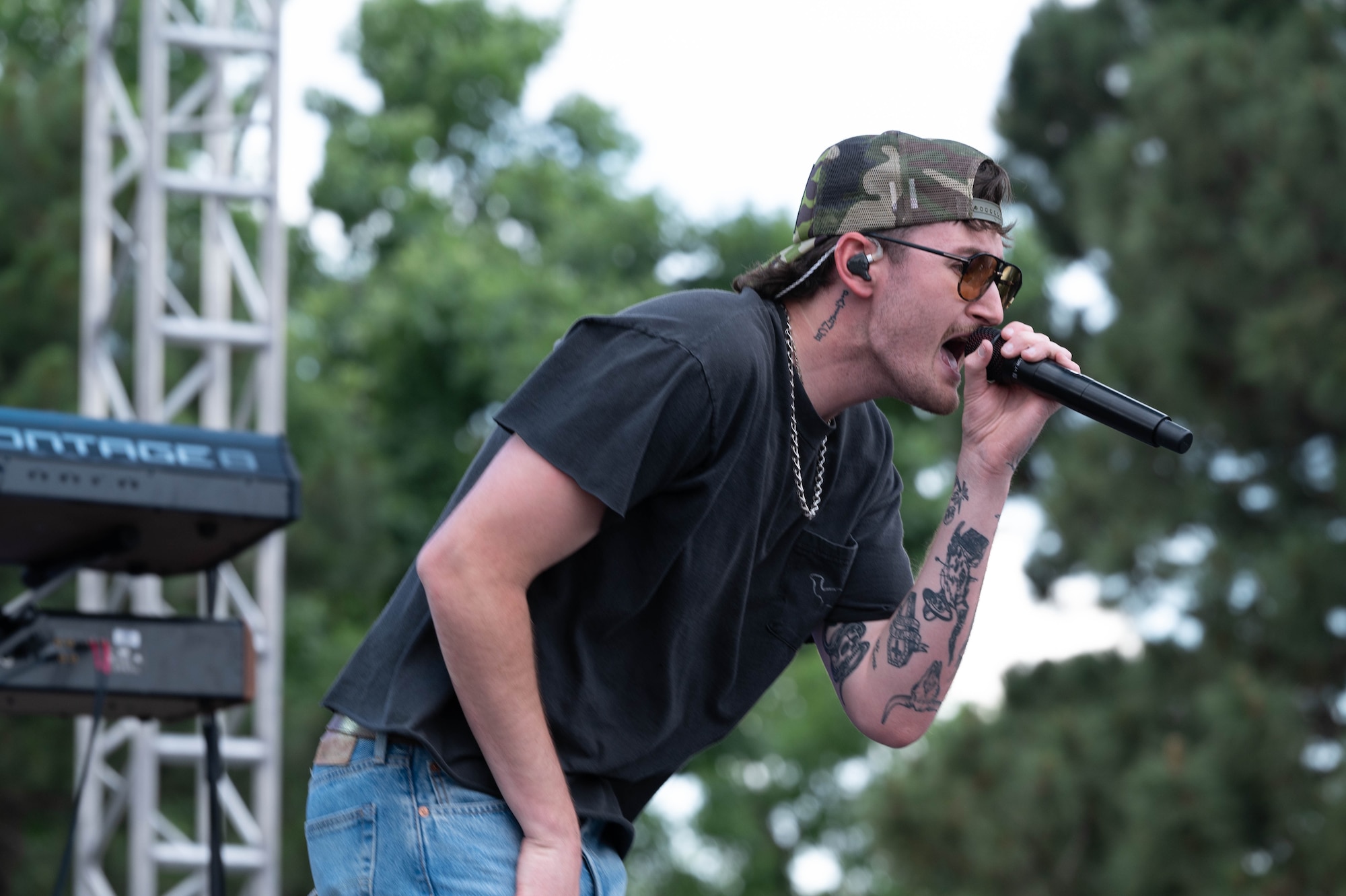 Austin Snell sings to the crowd at Peterson Space Force Base