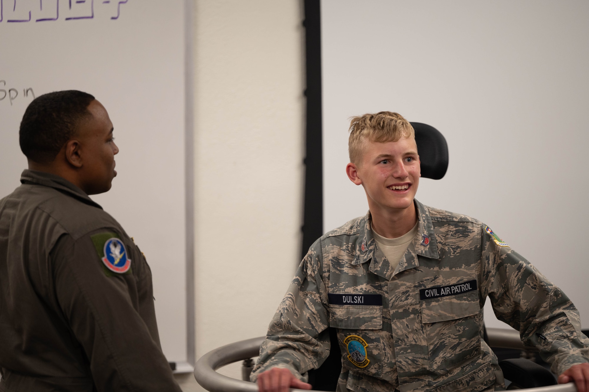 A cadet experiences spatial disorientation while sitting on the Barany chair.