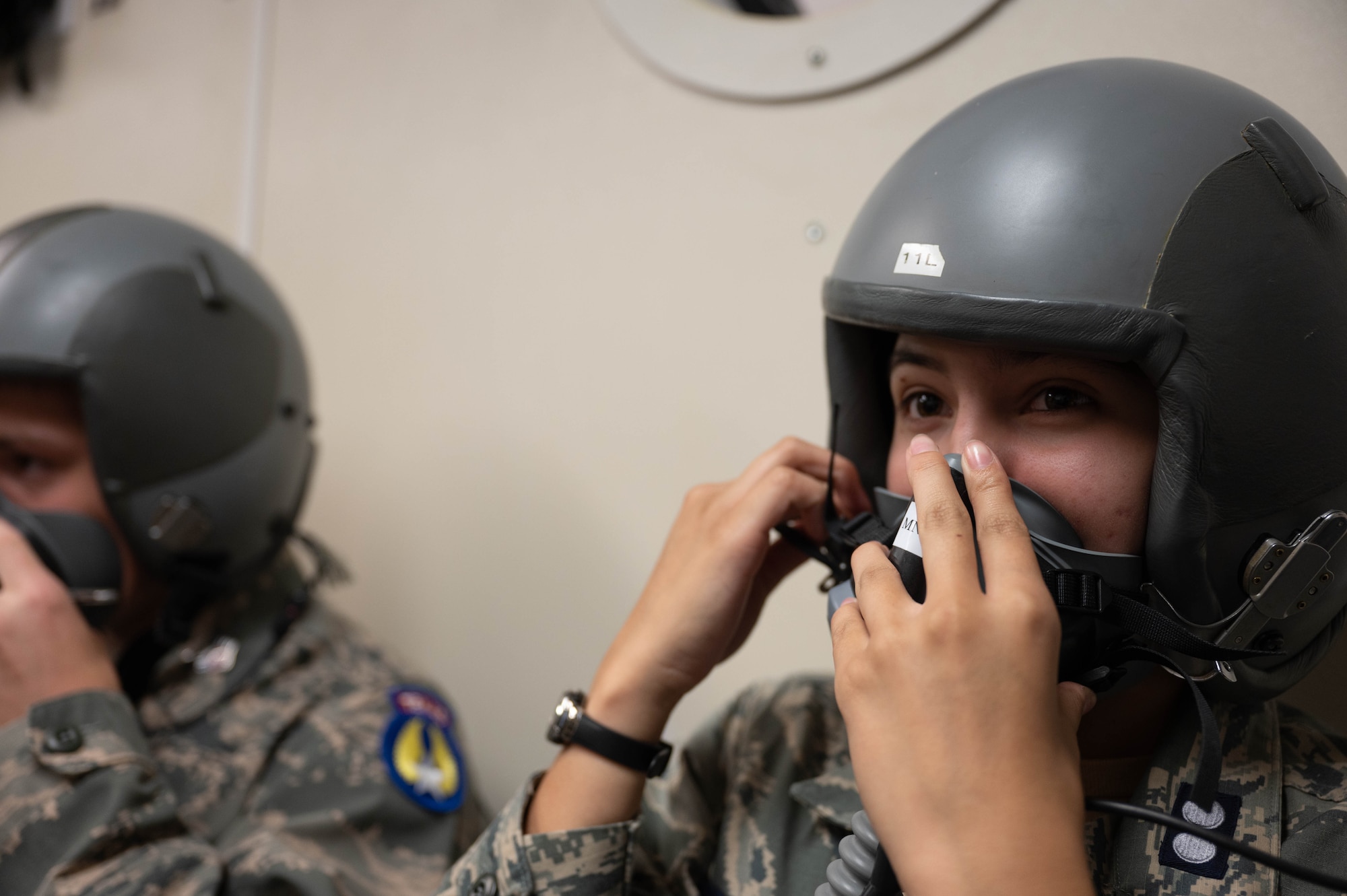 Cadets don a helmet and a face mask while at the altitude chamber