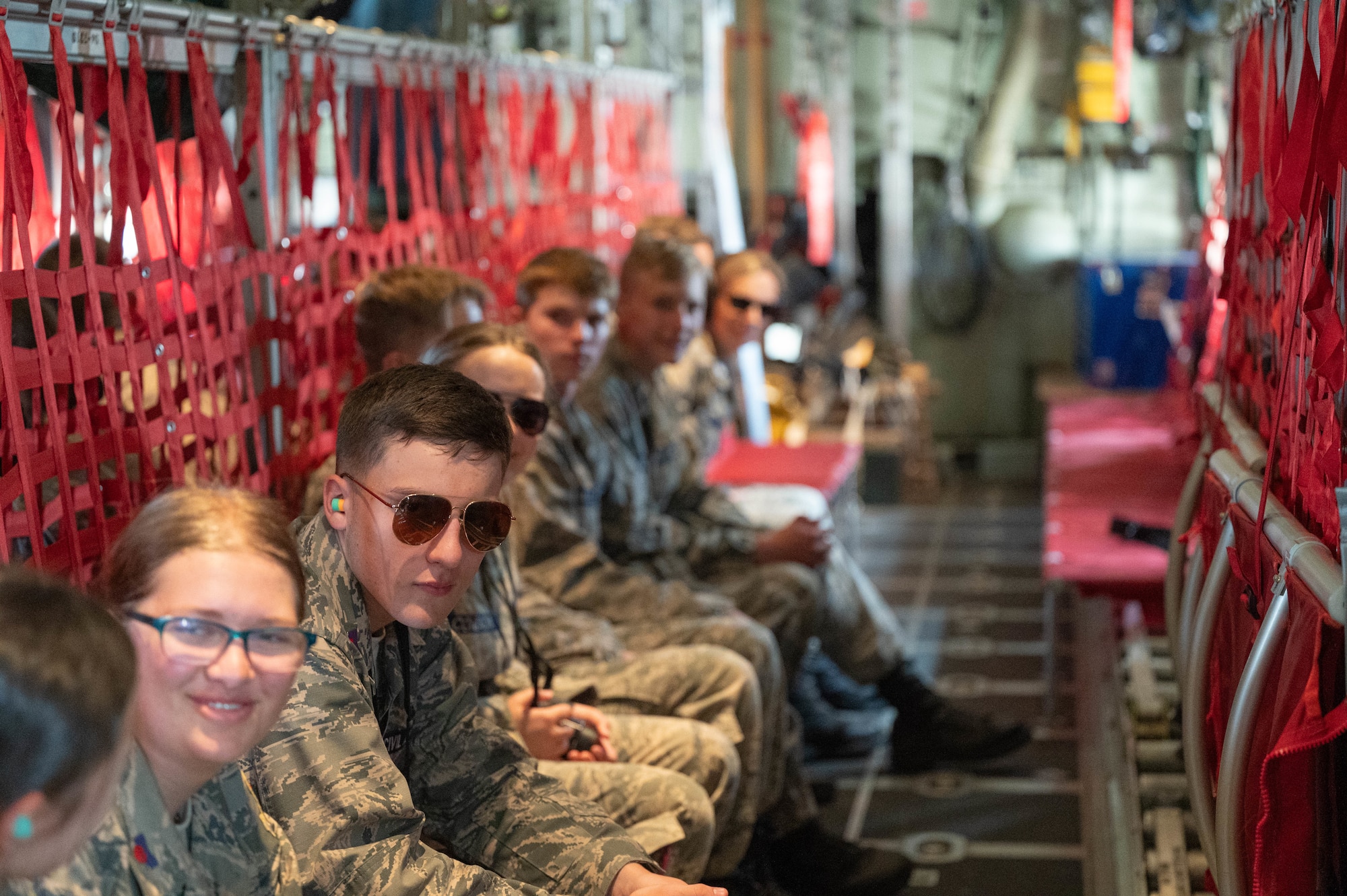 Cadets sit in the C-130 Hercules as it get ready for take-off