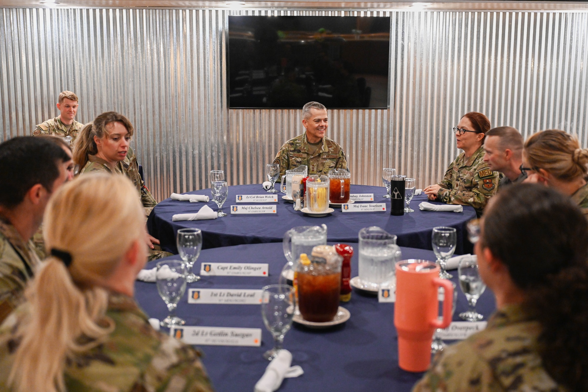 U.S. Air Force Lt. Gen. John J. DeGoes, U.S. Air Force Surgeon General, center, has lunch with officers from the 97th Medical Group at Altus Air Force Base, Oklahoma, Aug. 26, 2024. One purpose of the tour was to inform DeGoes of key challenges the 97th Medical Group faces and to find solutions. (U.S. Air Force photo by Airman 1st Class Jonah Bliss)