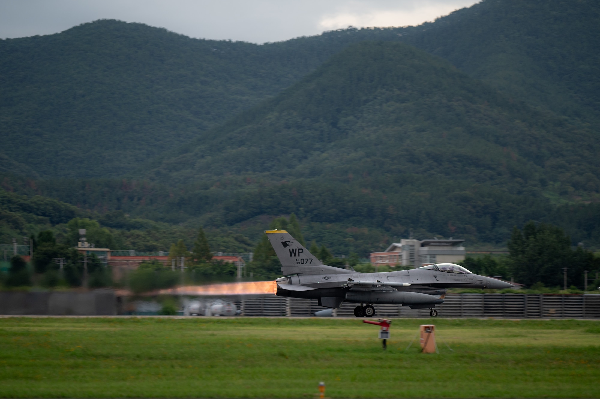 An F-16 Fighting Falcon assigned to the 80th Fighter Squadron takes off during Ulchi Freedom Shield 2024 at a cooperating base location in the Republic of Korea, Aug. 22, 2024. Regularly testing response capabilities is vital to maintaining a properly postured force that is prepared to deliver airpower in the U.S. Indo-Pacific Command area of responsibility at any time. (U.S. Air Force photo by Senior Airman Brittany Russell)