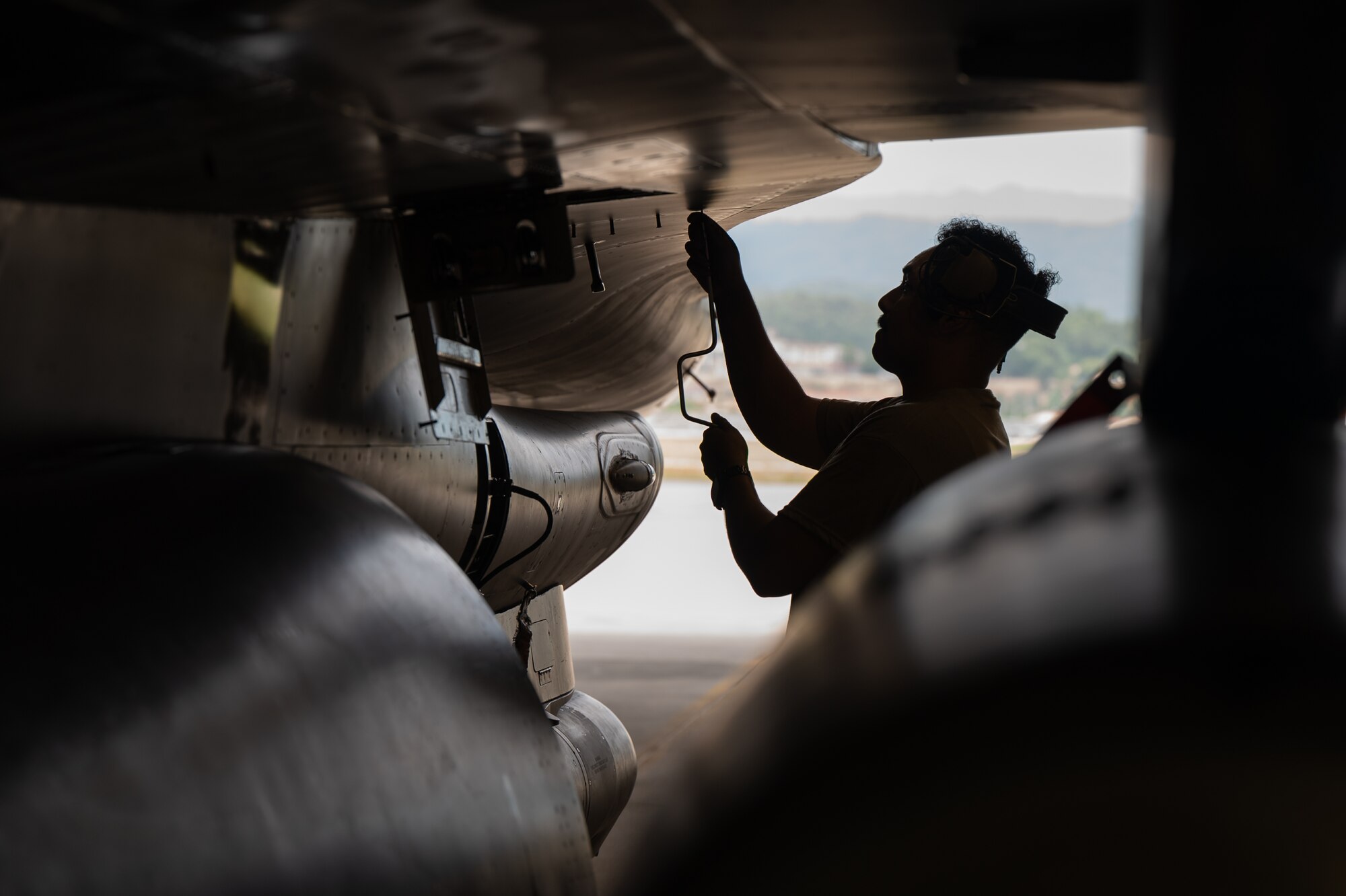 U.S. Air Force Staff Sgt. Jefte Reyes Salinas, 36th Fighter Generation Squadron crew chief, performs pre-flight maintenance during Ulchi Freedom Shield 24 at an unspecified location in the Republic of Korea, Aug. 19, 2024. Participation in routine training such as UFS24 ensures members and aircraft assigned to the 51st Fighter Wing are always prepared to “Fight Tonight.” (U.S. Air Force photo by Senior Airman Brittany Russell)