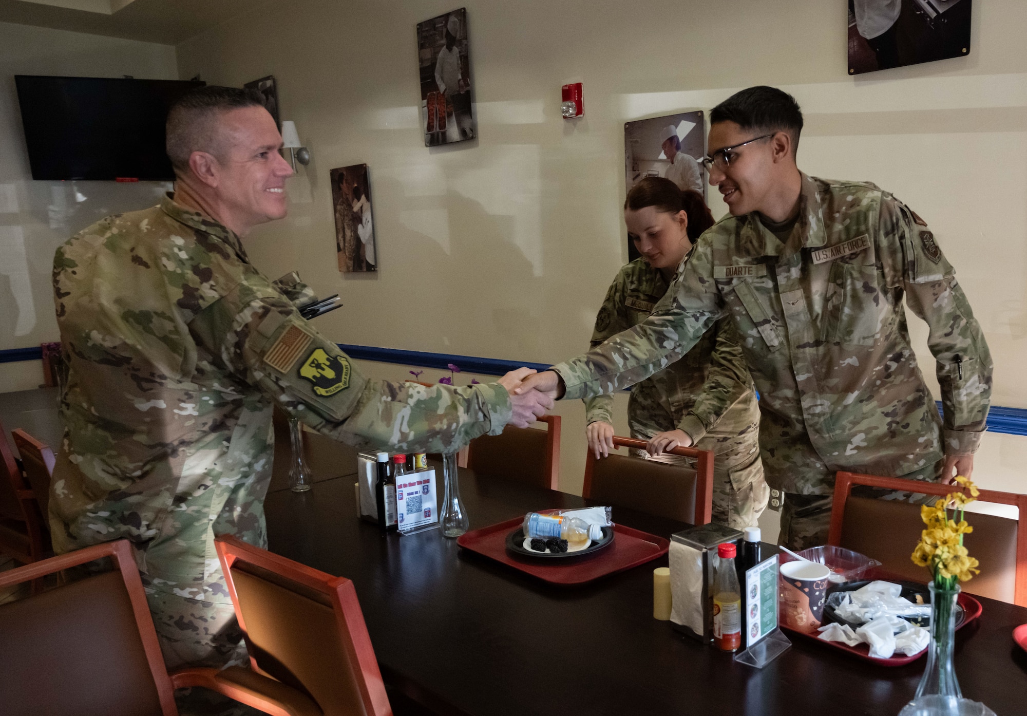 U.S. Airmen shake hands