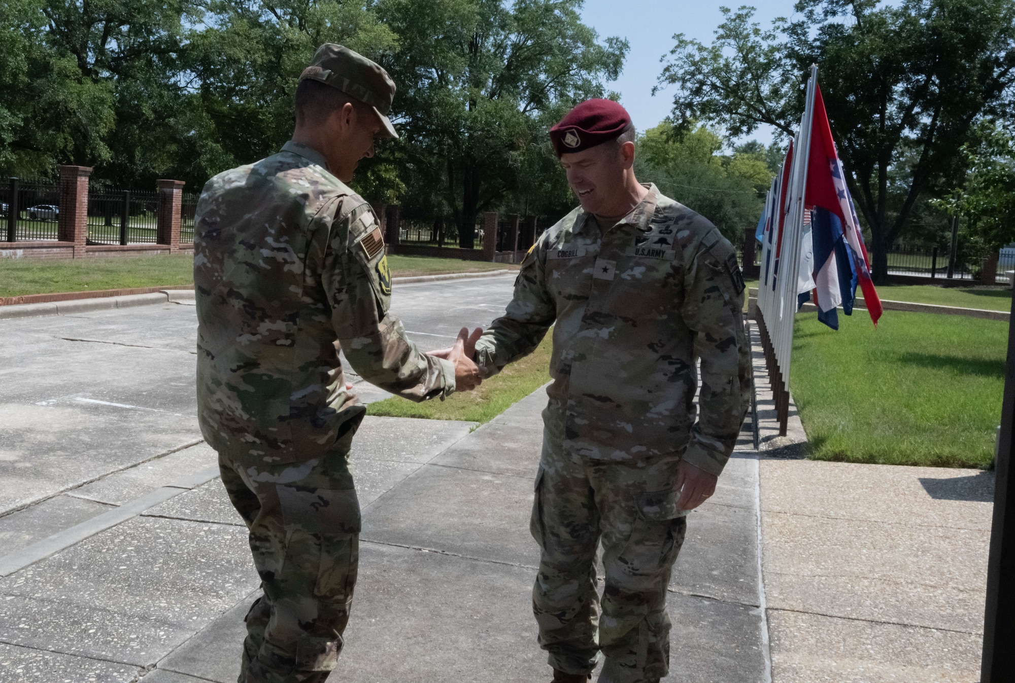 U.S. Airman and U.S. Soldier shake hands