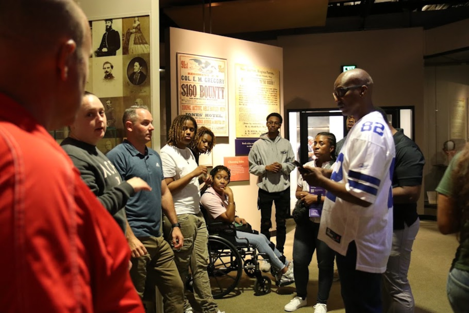 Members of the 74th Troop Command, District of Columbia National Guard, explore exhibitions and collections inside the Smithsonian's National Museum of American History during a team-building staff ride in Washington, D.C., on Aug. 11, 2024. The purpose of the visit was to deepen their understanding of the nation’s heritage and strengthen unit cohesion.