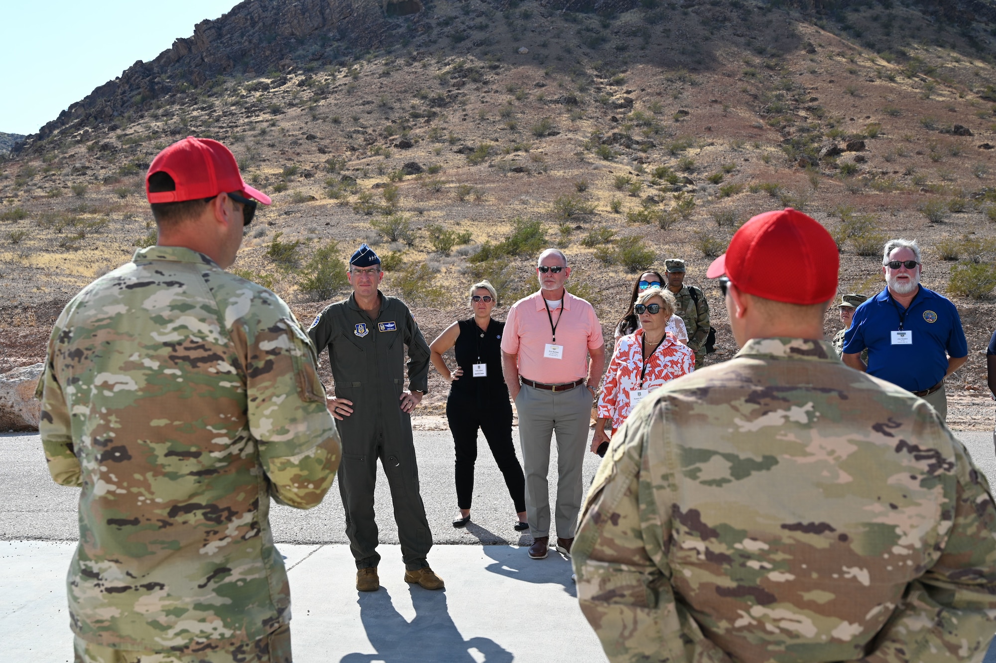 Military members talk with Lt. Gen. John Healy and Air Force Reserve Command honorary commanders.