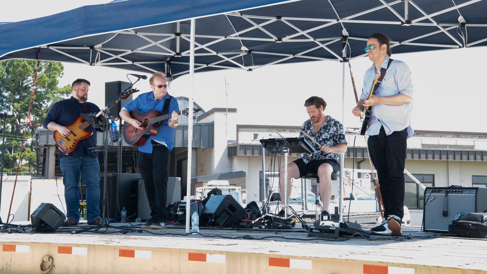 A band plays music on-stage.